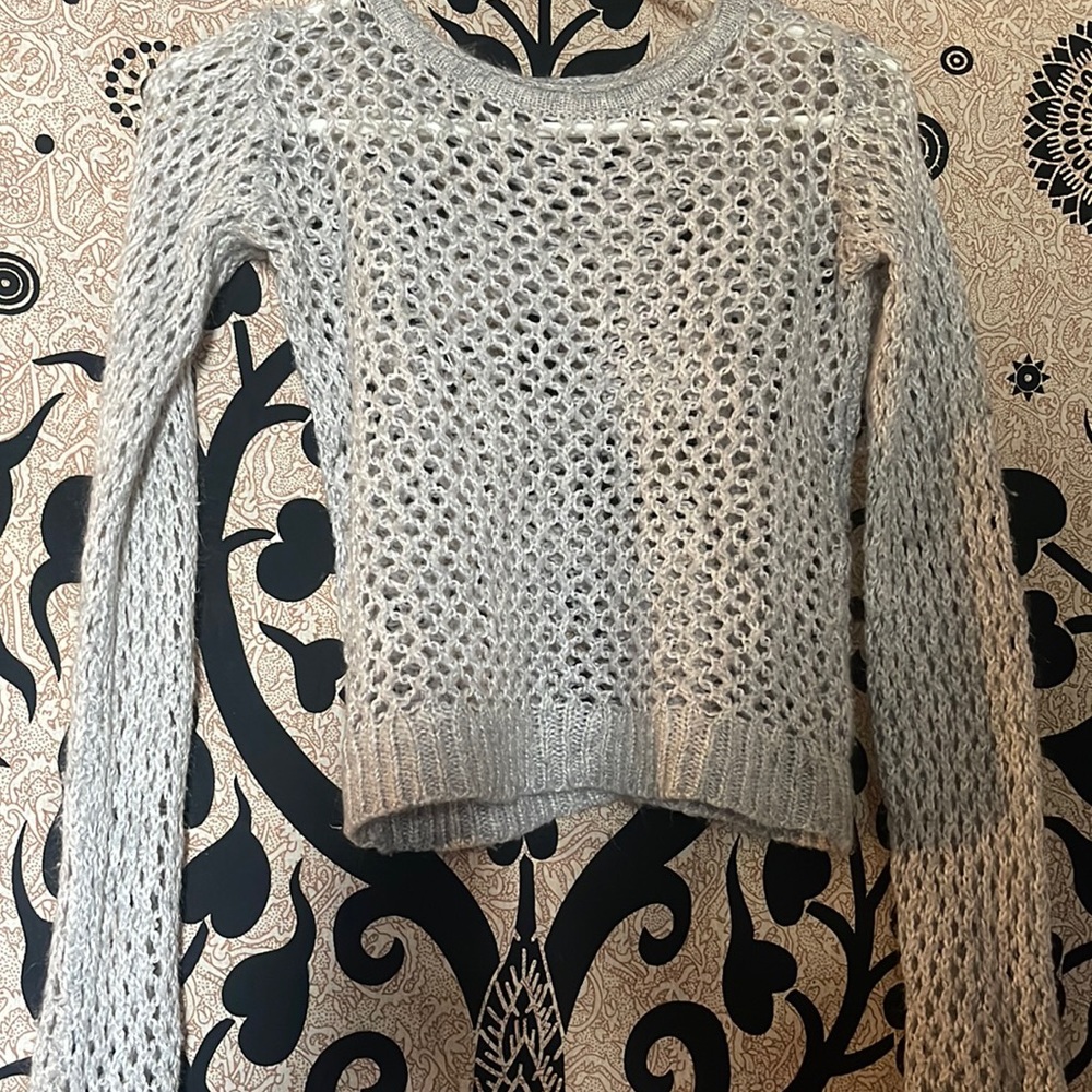 Very cute knitted sweater can wear it over a cute tank top!